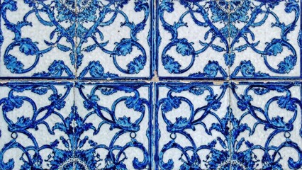 a background made of vintage tiles with blue ceramic designs