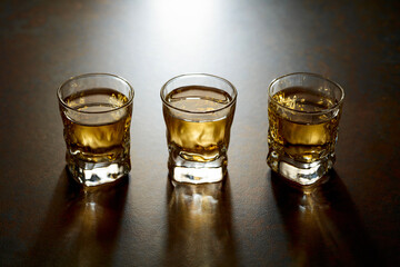 Small glasses of strong alcoholic drink.