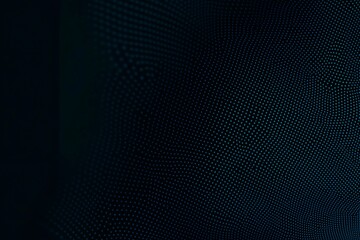 Obraz premium Abstract close-up of a glowing blue digital circuit board, showcasing intricate connections and technological design on a black background. 