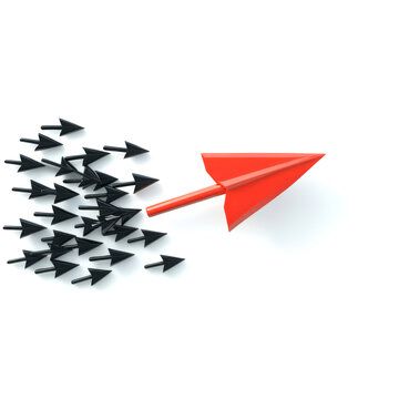 Creative concept illustrating a red arrow leading black arrows, symbolizing direction and leadership