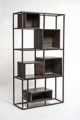Small metal bookshelf with open shelves on a white background