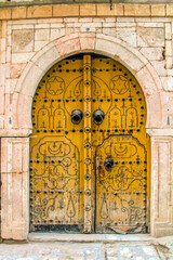 Traditional door in the streets of the medina of Tunis