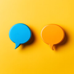 Blue and Orange Speech Bubbles on Yellow Background