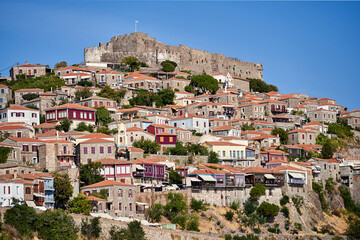 Historic houses and castle on top of a hill in Molyvos on the island of Lesbos