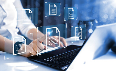 Law regulation and compliance rules on virtual screen concept.	
Business person working at laptop...