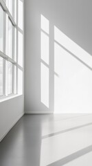 Obraz premium Clean studio room with spotlight focusing on a seamless white background, minimalist decor, and polished surfaces ideal for professional workspaces