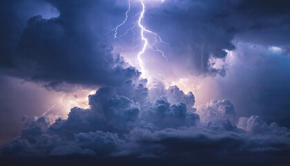 Dramatic lightning display illuminating a dark, stormy sky over a distant landscape at twilight