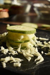 zucchini slices with grated cheese