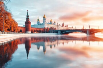 Obraz premium A majestic view of the Kremlin at sunrise, with its iconic red walls and St. Basil Cathedral glowing in soft morning light