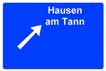 Illustration eines Autobahn-Ausfahrtschildes mit der Beschriftung "Hausen am Tann"