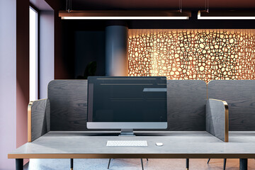 Modern workspace with desktop computer, sleek partition, and decorative backdrop illuminated by warm light. 3D Rendering