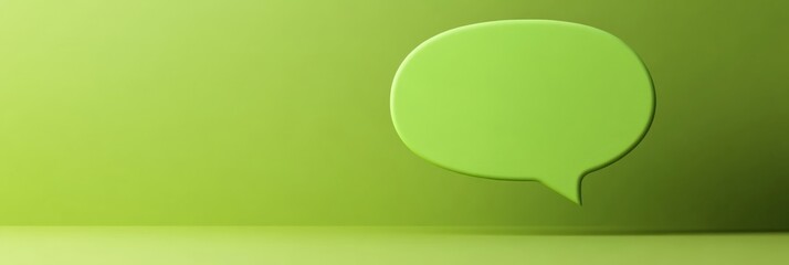 Fototapeta premium Floating green speech bubble against a vibrant green background, representing online messaging, engaging dialogue, and modern communication in the digital landscape