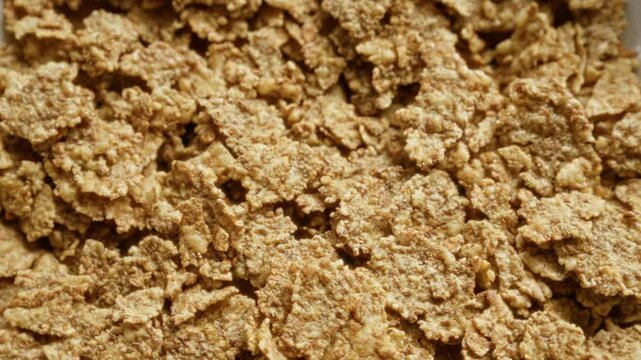 Close-up view of corn flakes showcasing detailed texture in a breakfast setting