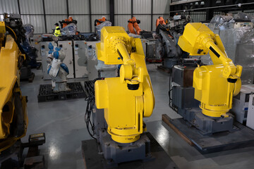 Fototapeta premium Industrial robot arm at factory 