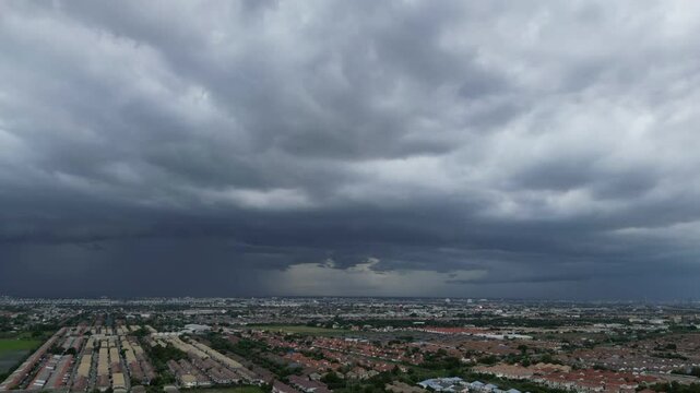 Hyperlapse scene showcasing the dramatic presence of dark clouds rolling over in Rangsit, Thailand