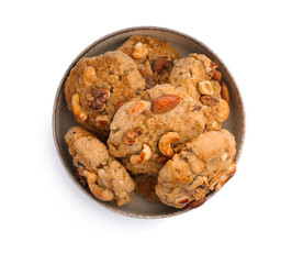 Tasty cookies with nuts in bowl isolated on white, top view