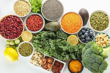 Superfood. Different healthy food products on white background, flat lay