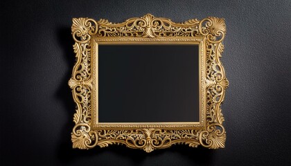 mirror with gold carved frame on black wall