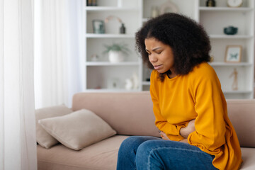 Stomach Ache. Sick Black Woman Suffering From Acute Abdominal Pain At Home, Young African American...