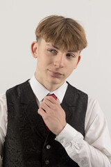 Teenage boy wearing a suit