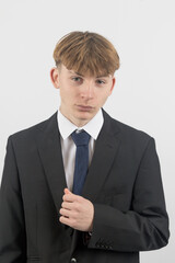 Teenage boy wearing a suit