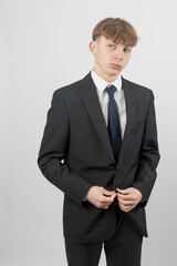 Teenage boy wearing a suit