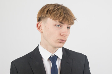 Teenage boy wearing a suit