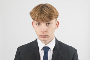 Teenage boy wearing a suit