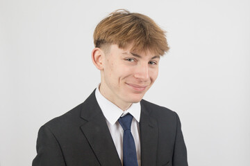 Teenage boy wearing a suit