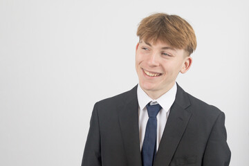 Teenage boy wearing a suit
