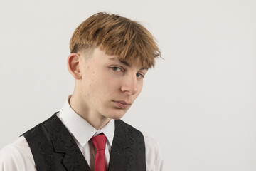 Teenage boy wearing a suit