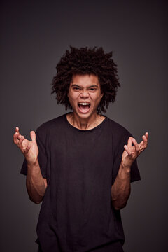 Studio Portrait of a young mixed race man.