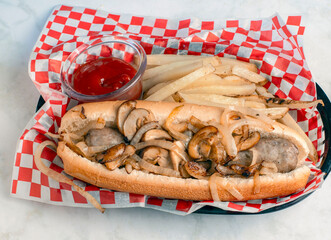 sweet italian sausage sub  top with  mushrooms and onions