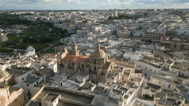 Aerial drone view of the historical town center in Ostuni in Puglia, Italy.