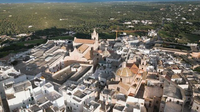Aerial drone view of the historical town center in Ostuni in Puglia, Italy.