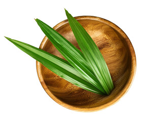 fresh pandan leaves isolated on white background, in wooden bowl, flat lay and top view