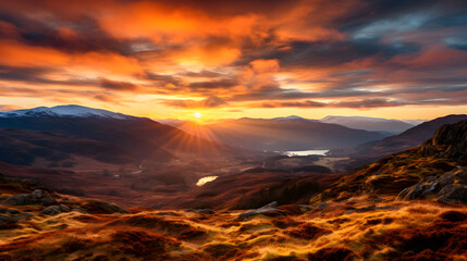 Breathtaking Highland Sunrise: A Symphony of Warm Hues and Silhouetted Terrains