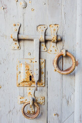Closeup of an old rusty door lock