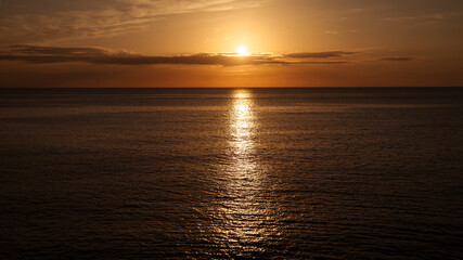 Sunset in the sea in orange tones, Sardinia