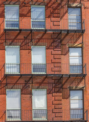 Red brick facade. with windows, common in BostonCR2