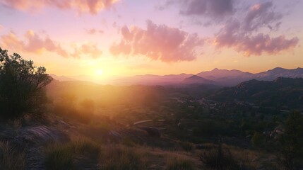 Naklejka premium A serene sunset over rolling hills and valleys, capturing the beauty of nature.