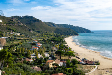 Naklejka premium Sandy beach of medieval small touristic coastal town Sperlonga and sea shore, Latina, Italy