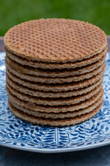 Traditional Dutch sweet dessert, Butter caramel syrup waffles, fresh baked