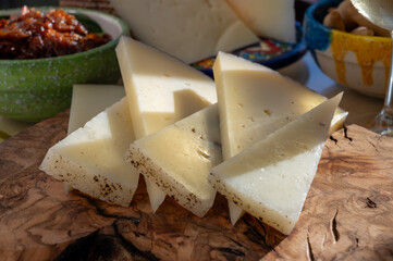 Cheese collection, Spanish matured cheese and onion chutney close up