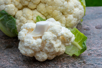 Healthy vegetarian food concept, raw cauliflower white cabbage ready for cooking