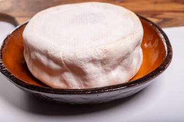 Cheese collection, French reblochon de savoie gratin cow milk cheese close up