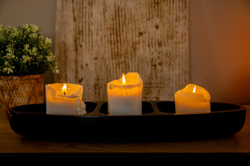 A Tranquil Atmosphere Enhanced by Softly Flickering Candles Positioned on a Wooden Tray