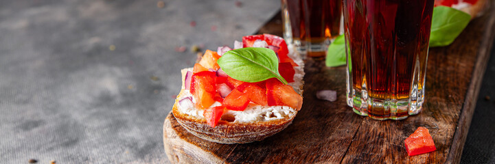 Bruschetta tomato of aperitif appetizer fresh tasty food dish delicious gourmet food background on the table rustic food top view copy space vegetarian vegan food