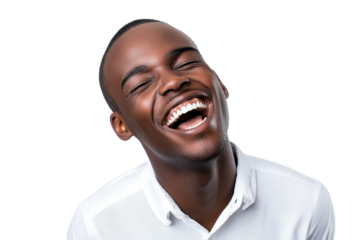 Joyful young man laughing heartily against a bright white background capturing pure happiness and spontaneity