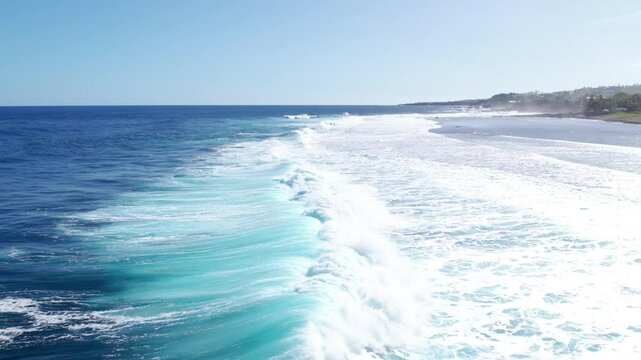 Aerial view on the chasm at Etang-Sal&eacute; in the south of Reunion island, with a turquoise sea and its corals